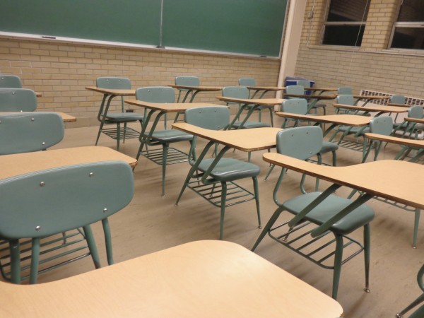 empty school desks in classroom